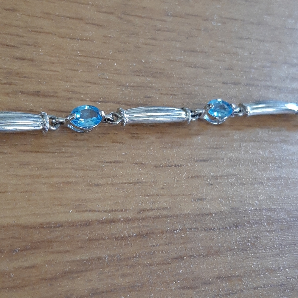 3 for $10 925 silver and blue topaz bracelet
